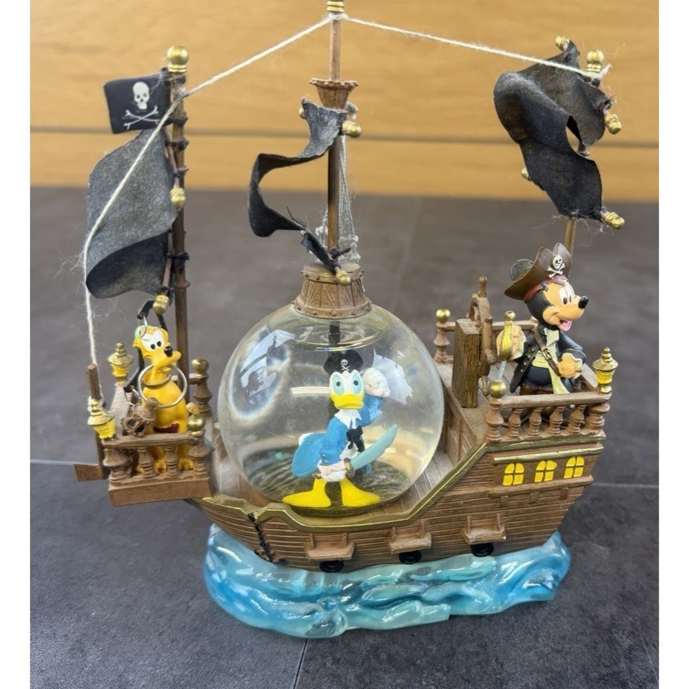 Disney Parkes Pirates of the Caribbean Snow Globe w/Mickey,Donald & Pluto